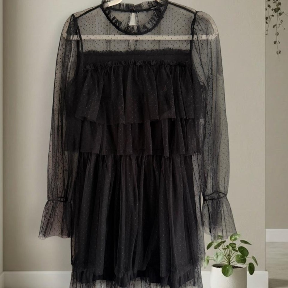 Black mesh long sleeve dress with ruffles and lace details. Size: M
